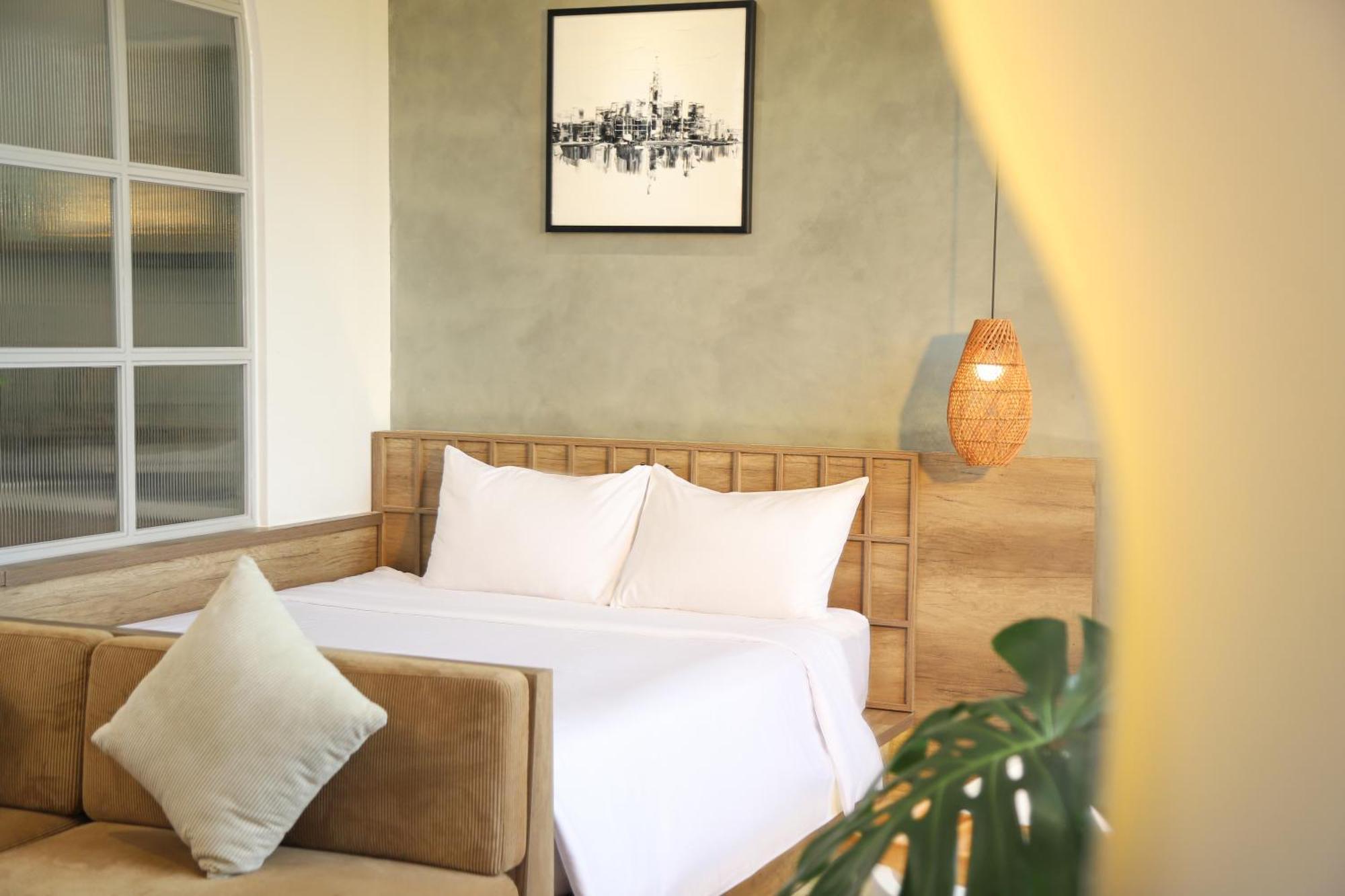 Khách sạn hẻo lánh Kin Wander Tan Phong *